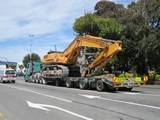 Digger on transporter