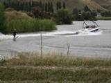 waterskiing in a pond