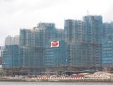 Buildings covered in bamboo scaffolding