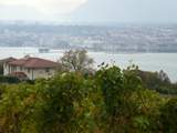 Lake Geneva - the background is a mixture of smog and rain