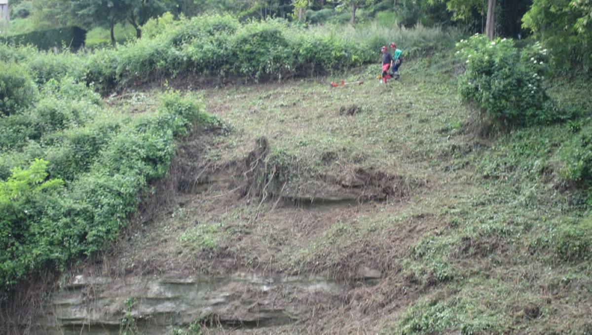 workers on steep slope